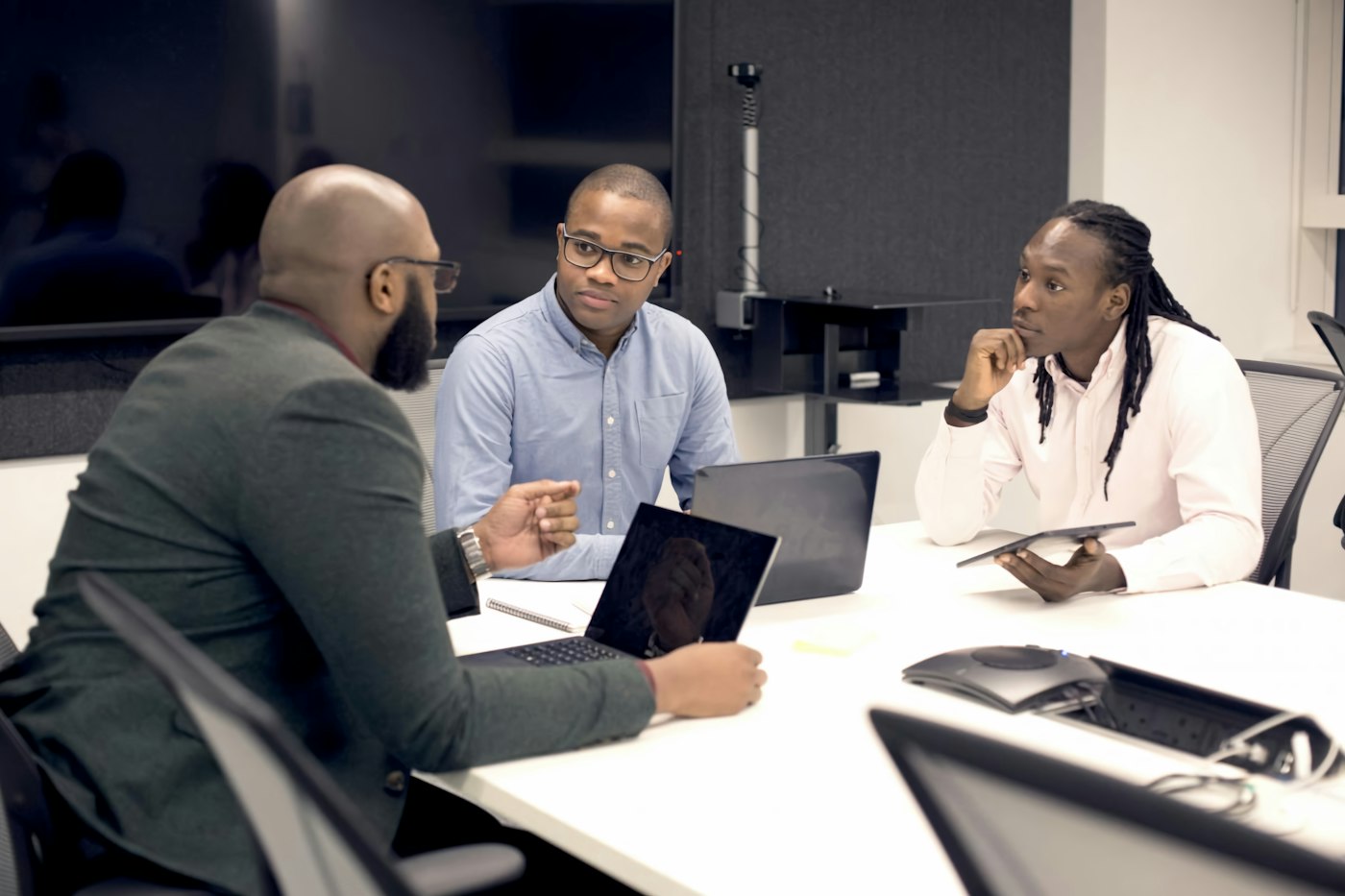 Programme team reviewing progress in a boardroom