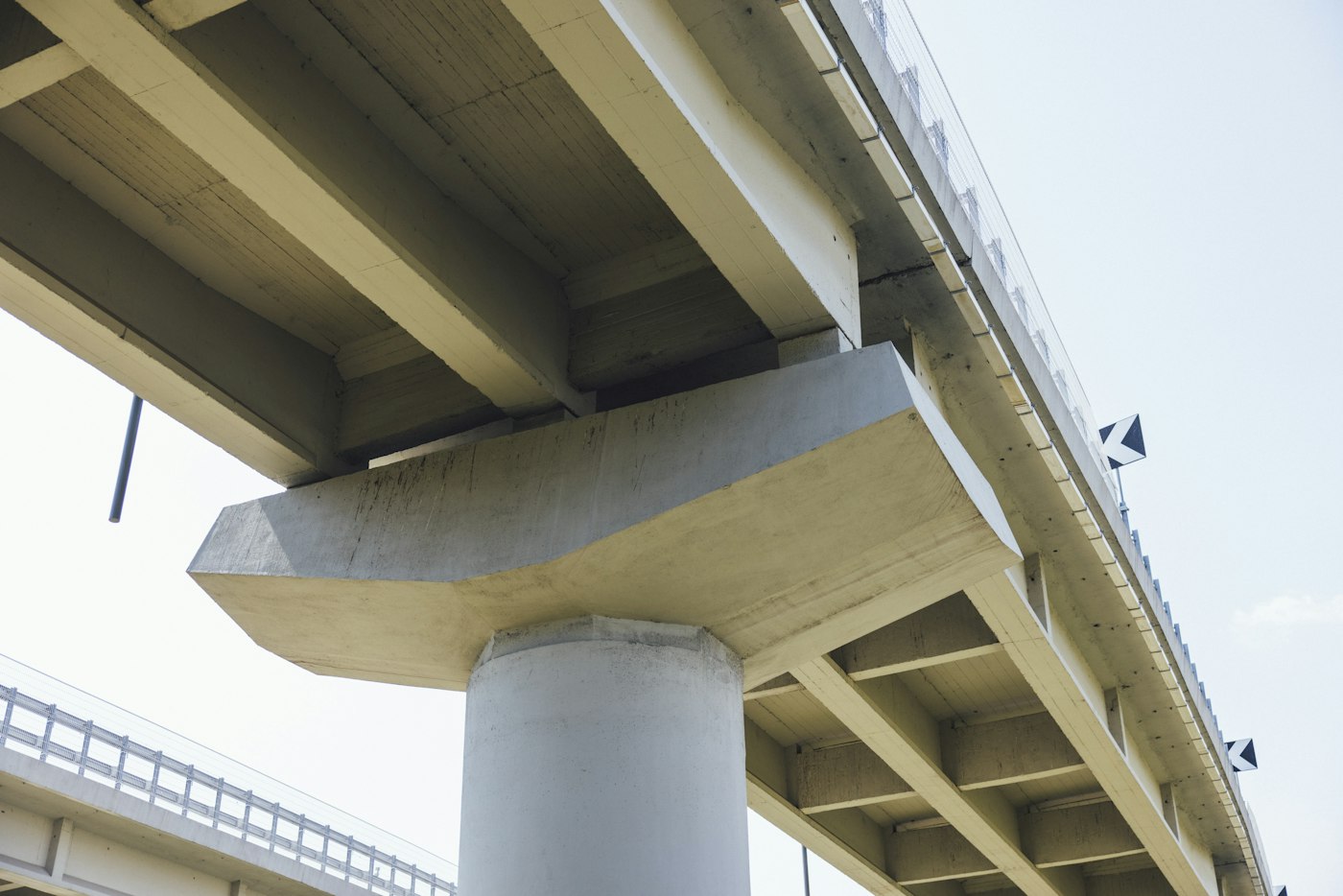 Concrete pier and deck of an elevated roadway